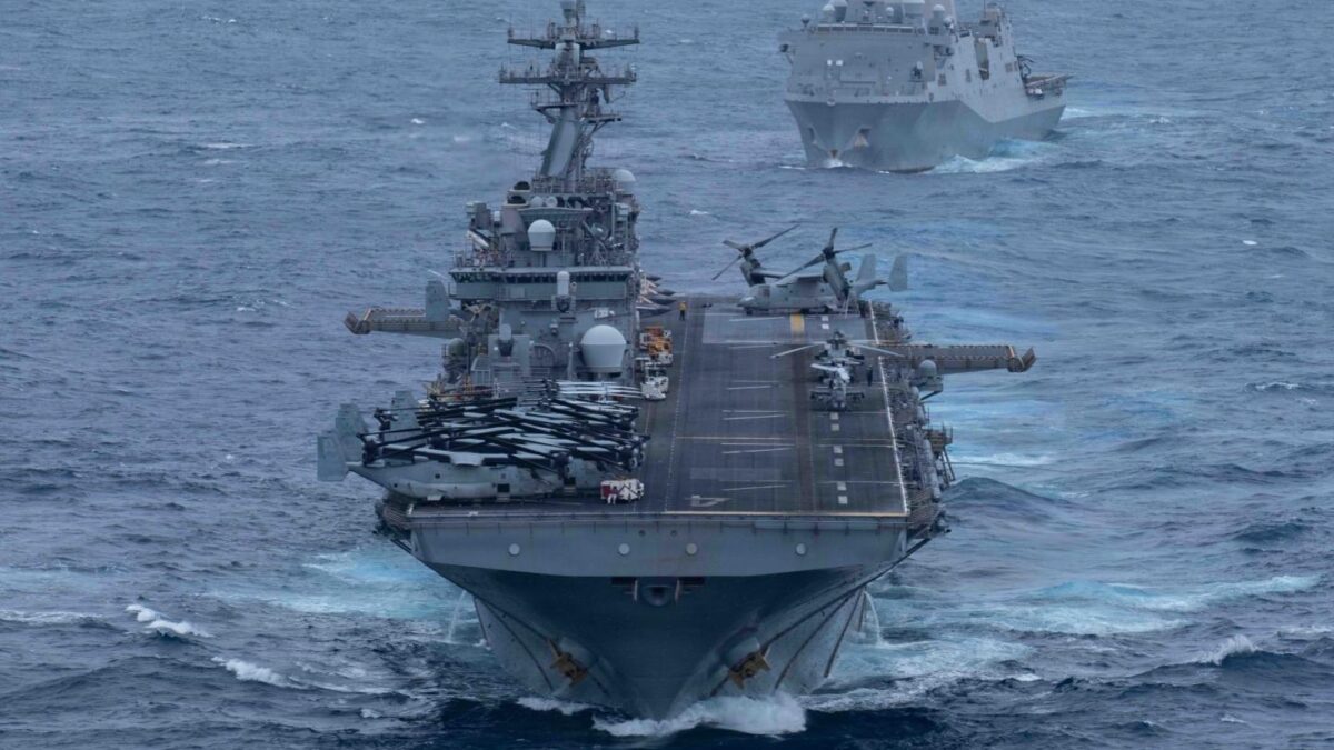 Wasp-class amphibious assault ship USS Boxer (LHD 4), front, and San Antonio-class amphibious transport dock ship USS Portland (LPD-27), sail in formation in the U.S. Central Command area of responsibility, June 30, 2026.