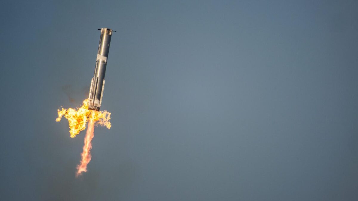 The SpaceX Starship Flight 8 booster returns returns from its ascent at Boca Chica beach on March 6, 2025 in Boca Chica Beach, Texas.