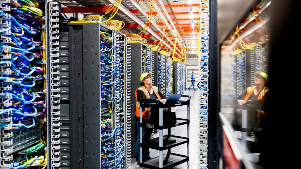 A technician at an Amazon Web Services AI data center in New Carlisle, Ind., Oct. 2, 2025.