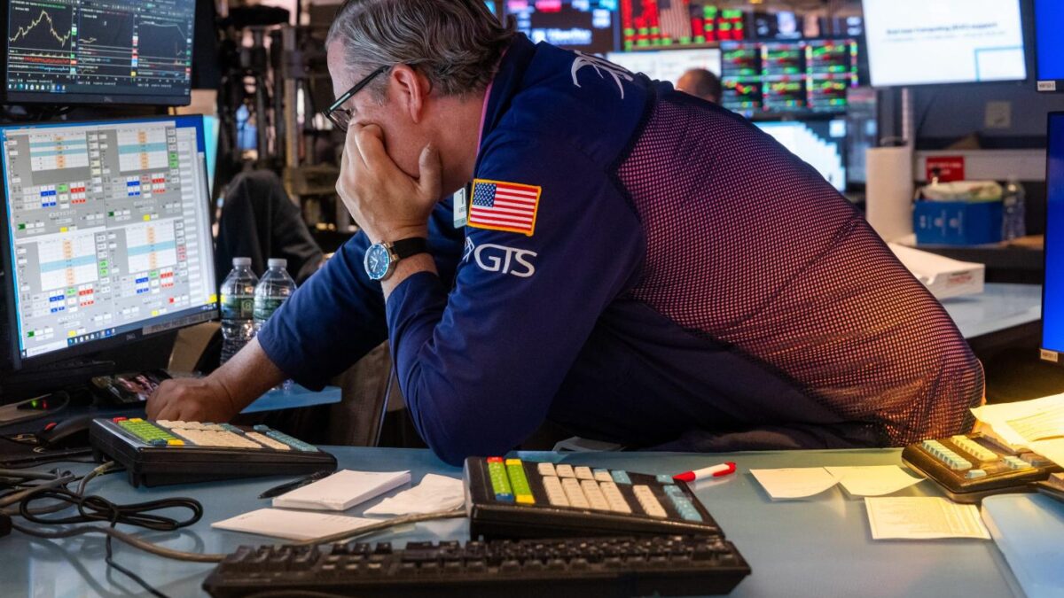 Traders work on the New York Stock Exchange (NYSE) on July 29, 2026.